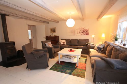 Wohnzimmer mit Kamin – Ferienhaus Ask